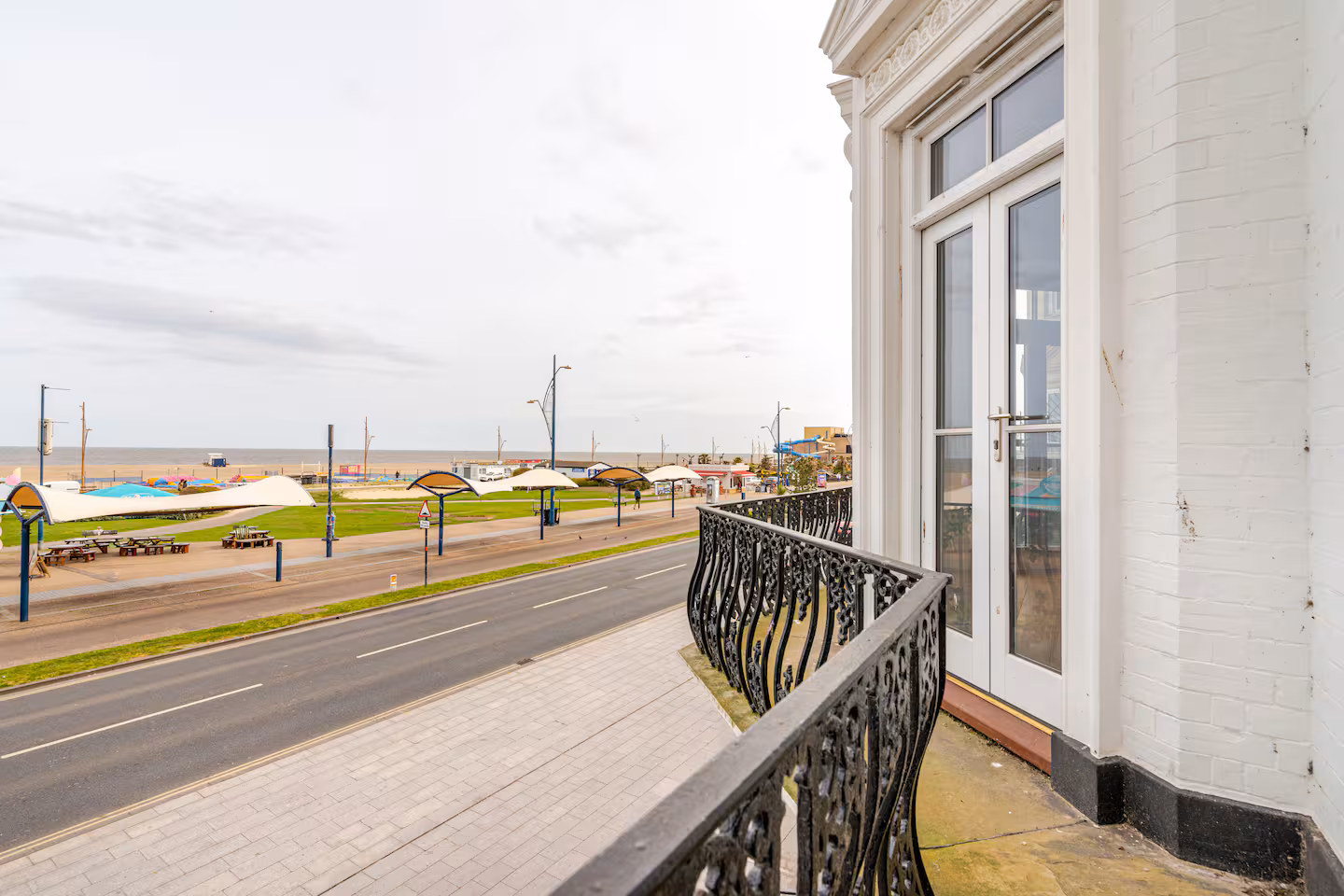 Belle Etage suite Juliet balcony with wrought iron railings and Great Yarmouth seafront view