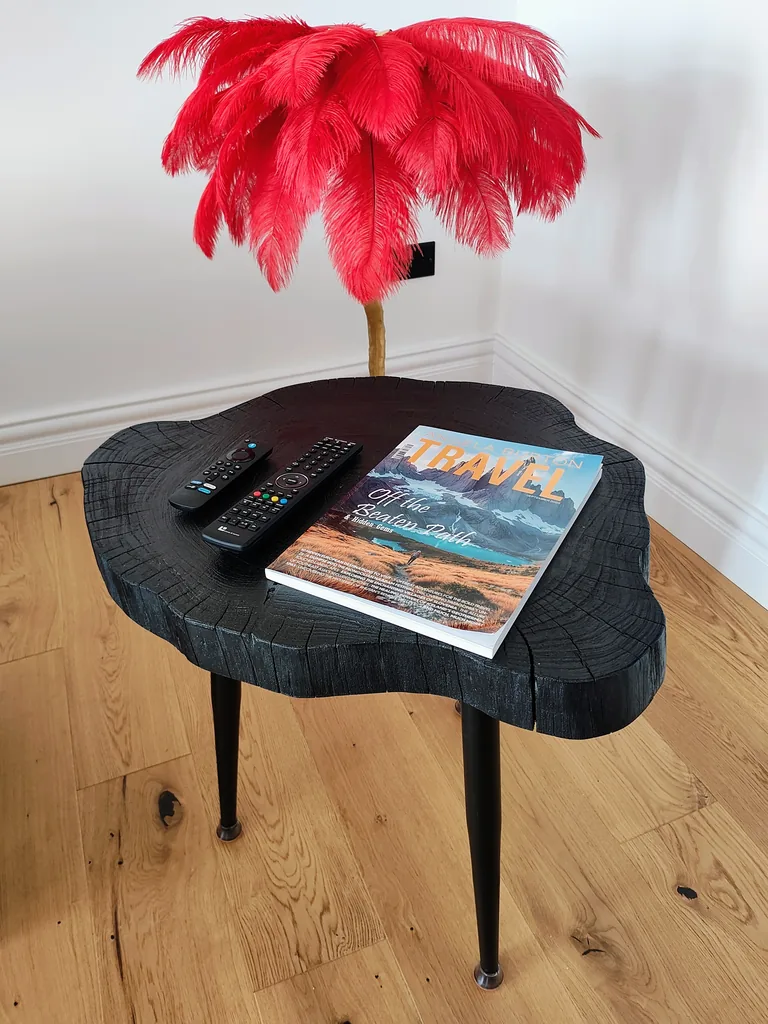 Belle Etage suite refined decorative details with travel magazine and feature lamp at Lavish Collections Great Yarmouth