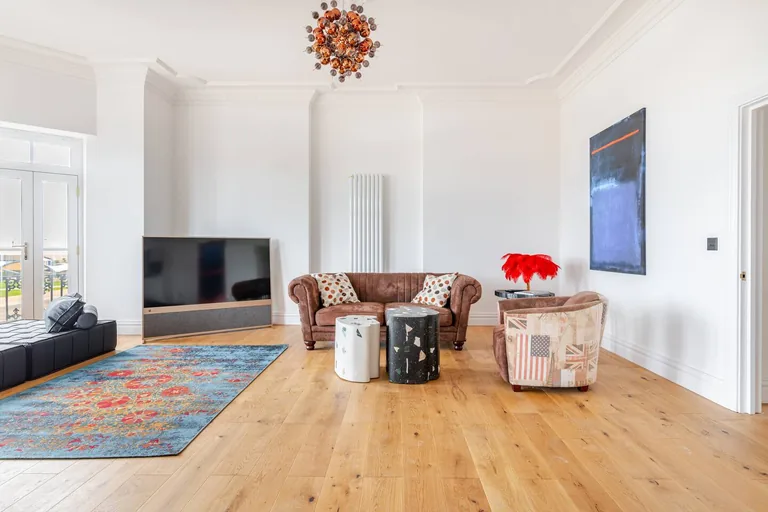 Belle Etage suite open-plan living and dining area at Lavish Collections Great Yarmouth