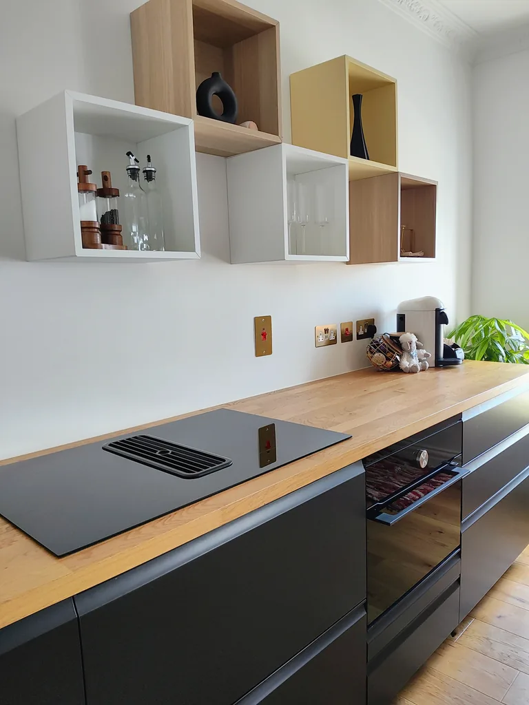 Ciel dOr suite fully-equipped modern kitchen with induction hob oven and cube shelving at Lavish Collections Great Yarmouth