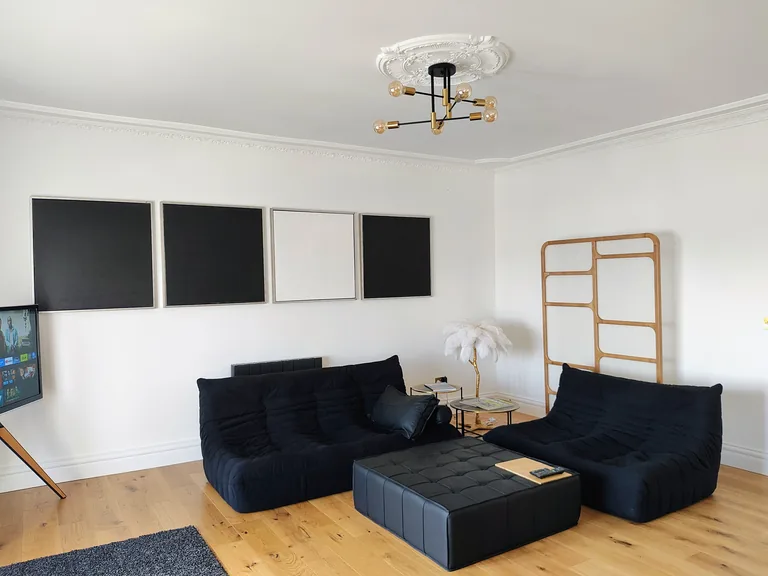 Ciel dOr suite sitting area with modular sofas and white feather feature lamp at Lavish Collections Great Yarmouth