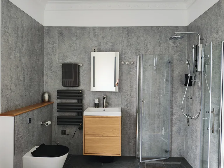 Seraphine suite luxury ensuite bathroom with rainfall shower and premium finishes at Lavish Collections Great Yarmouth