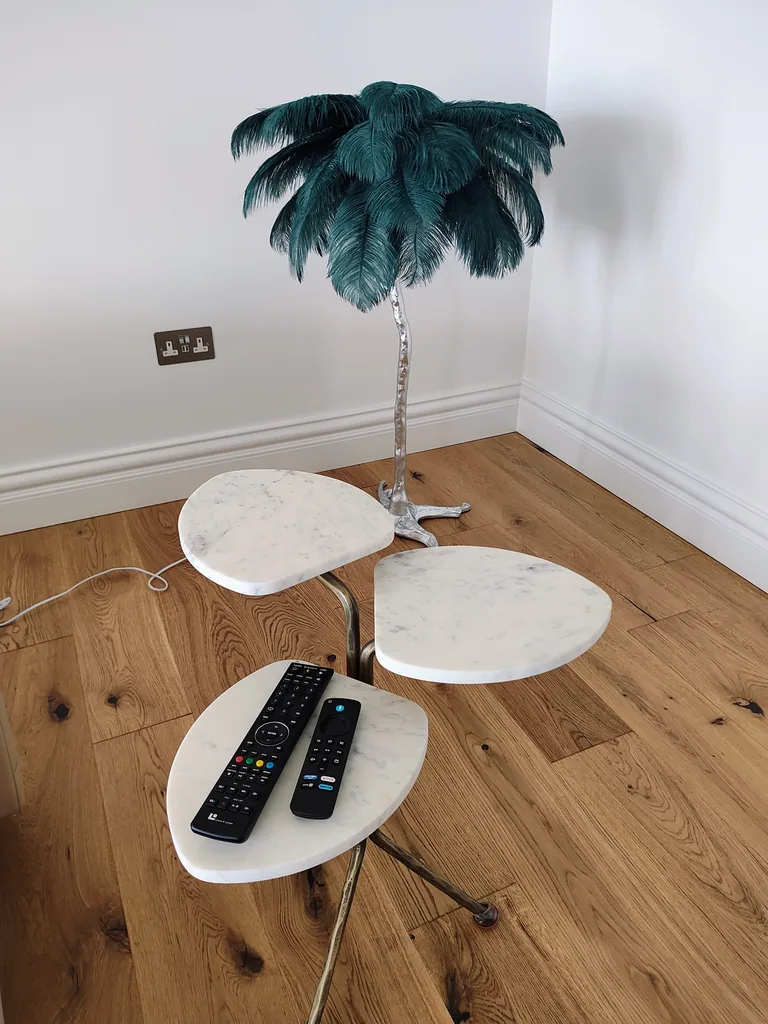 Seraphine suite refined decorative details with marble side tables and feature lamp at Lavish Collections Great Yarmouth